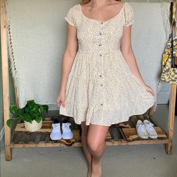 Off the shoulder yellow patterned mini dress. - Picture 1 of 2